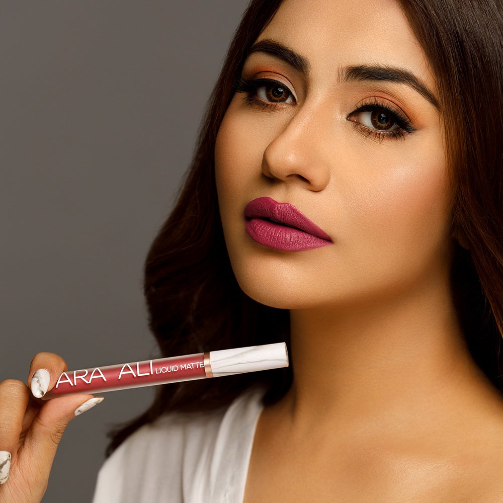 Sara Ali Cosmetics Aquarius medium dark berry pink lipstick
