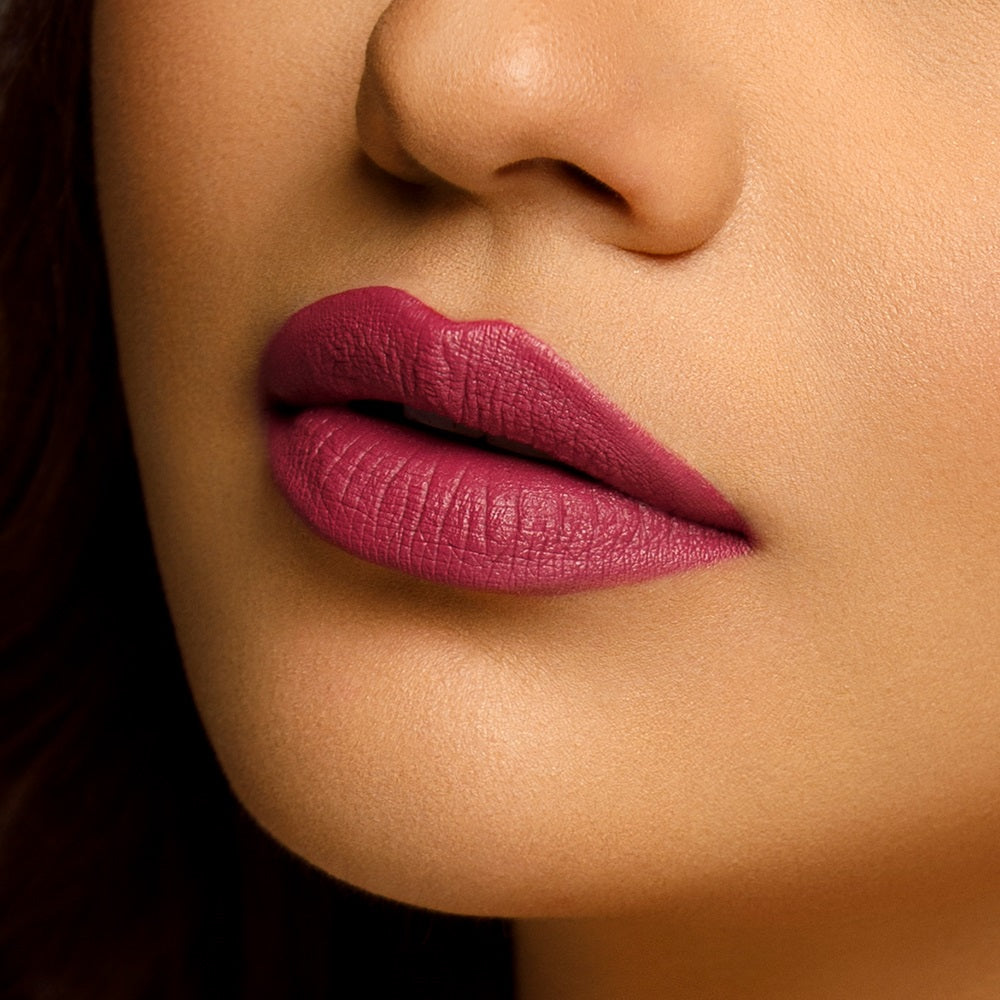 Sara Ali Cosmetics Aquarius medium dark berry pink lipstick