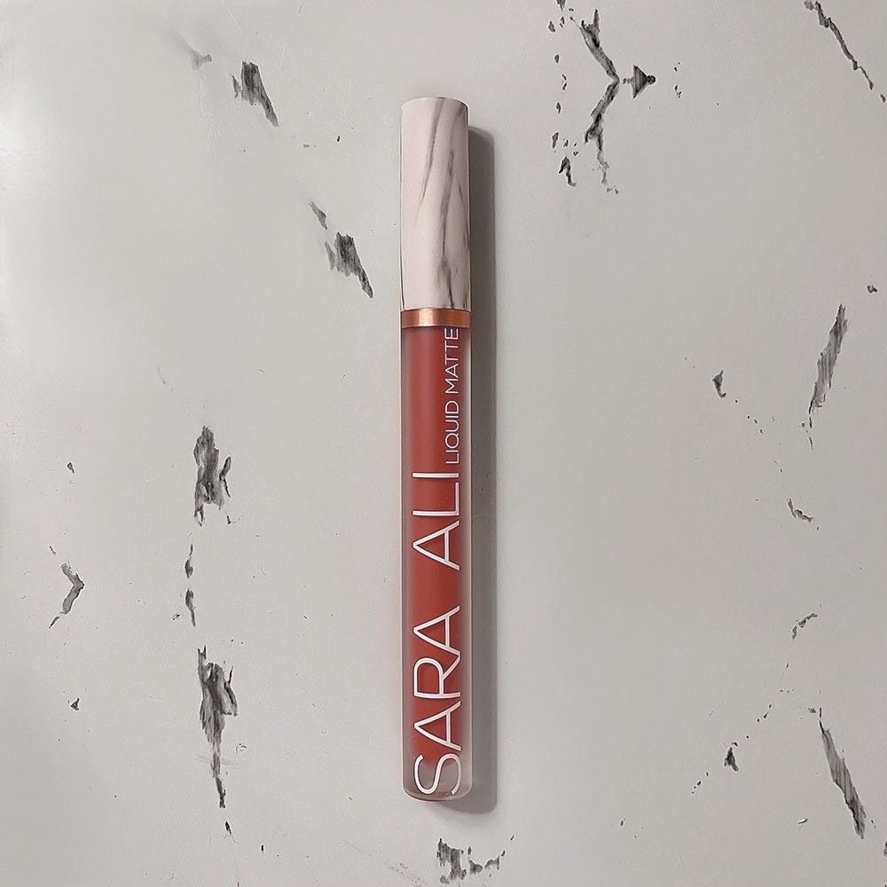 Sara Ali Cosmetics Capricorn warm tone medium dark coral lipstick