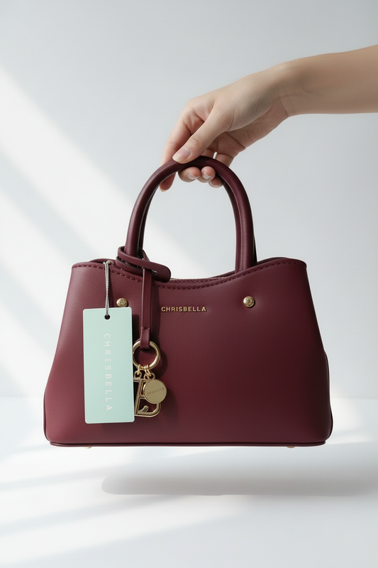 Chrisbella mini burgundy wine luxury handbag with adjustable sling and gold hardware for women in UAE