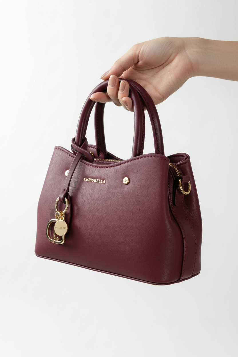 Chrisbella mini burgundy wine luxury handbag with adjustable sling and gold hardware for women in UAE